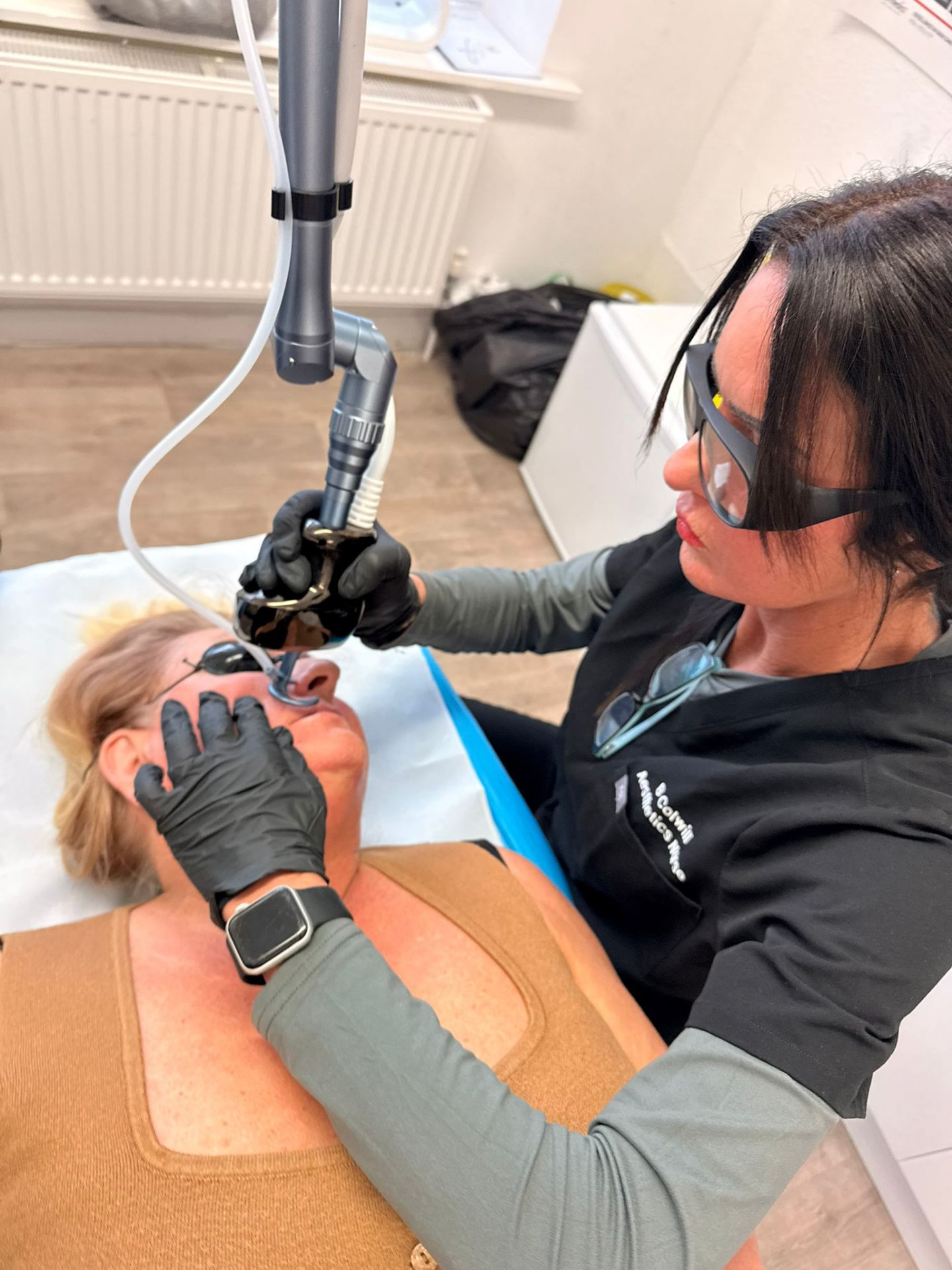 Becky Colwill performing CO2 Fractional Laser treatment on a patient
